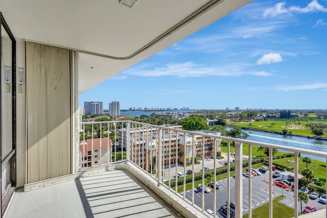 balcony featuring a water view