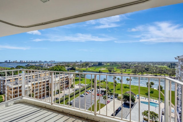 balcony featuring a water view