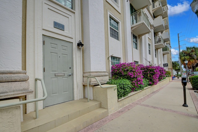 property entrance with a balcony