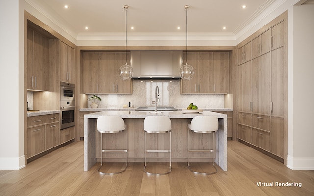 kitchen with tasteful backsplash, a kitchen island with sink, decorative light fixtures, and light wood-type flooring