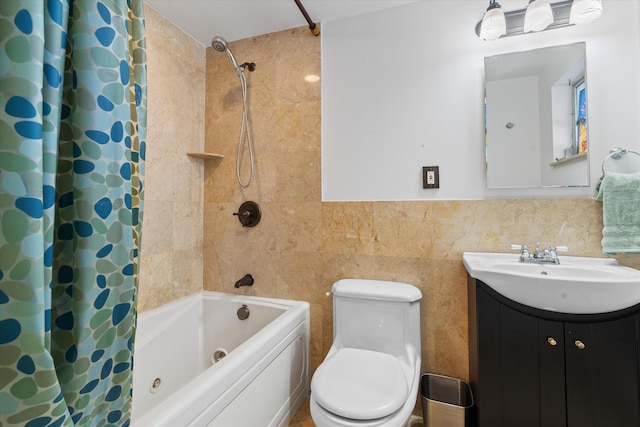 full bathroom with shower / bath combo, tile walls, vanity, and toilet