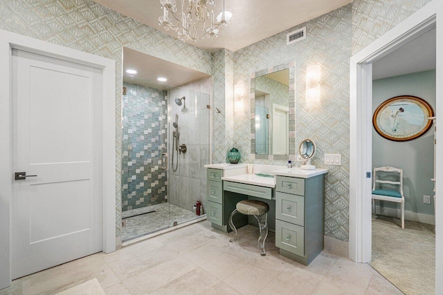 bathroom featuring vanity, walk in shower, tile flooring, and a notable chandelier