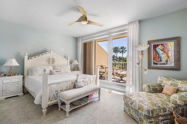 bedroom with light colored carpet, ceiling fan, and access to outside