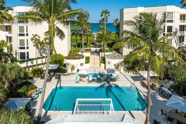 view of pool featuring a patio