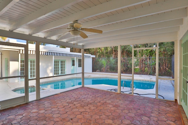 view of pool featuring ceiling fan and a patio