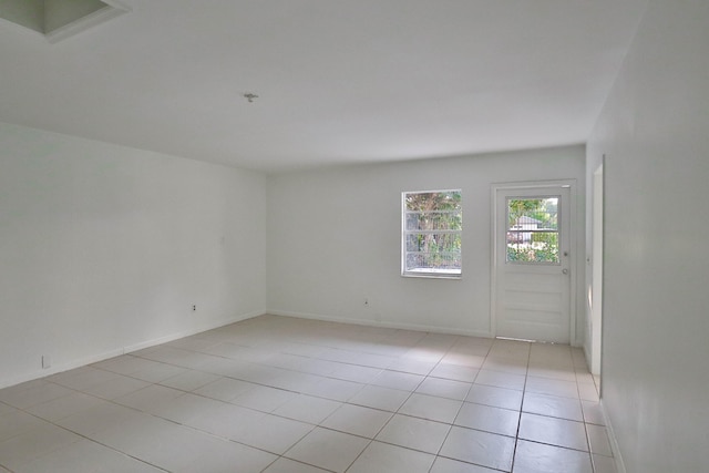 view of tiled spare room