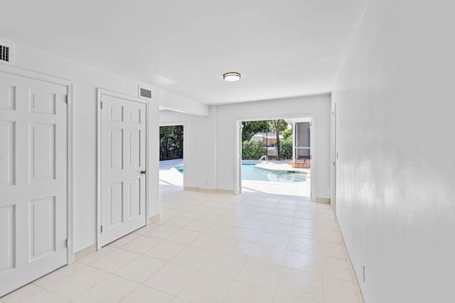 view of tiled spare room