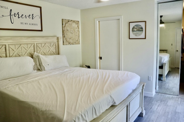 bedroom featuring light wood-type flooring