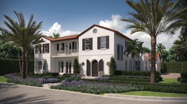 view of front facade featuring french doors and a balcony