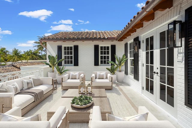 view of patio with an outdoor living space and french doors