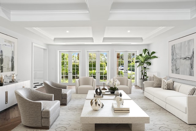 living room featuring coffered ceiling, beam ceiling, ornamental molding, and french doors