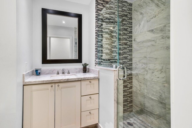 bathroom with vanity and walk in shower