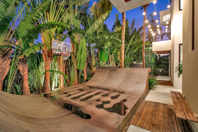 view of patio terrace at night