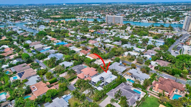 bird's eye view with a water view