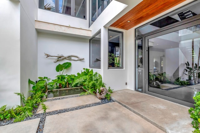 property entrance with a patio area