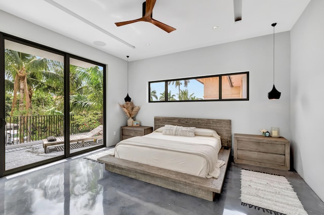 bedroom with access to exterior, ceiling fan, and multiple windows