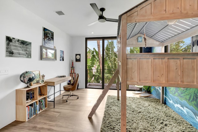 interior space featuring ceiling fan and vaulted ceiling