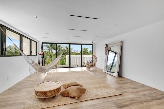 living room with light hardwood / wood-style floors