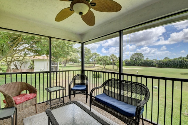 sunroom / solarium with ceiling fan