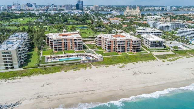 aerial view featuring a water view and a view of the beach