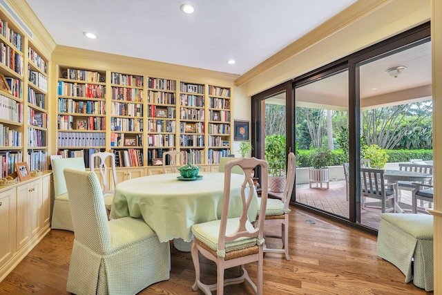 interior space with dark wood-type flooring and ornamental molding