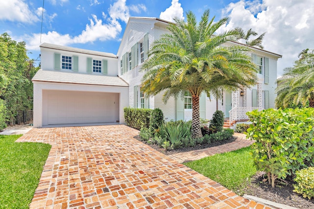 view of front of property with a garage