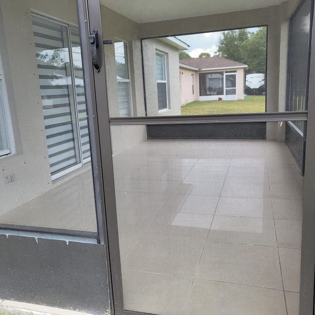 view of unfurnished sunroom