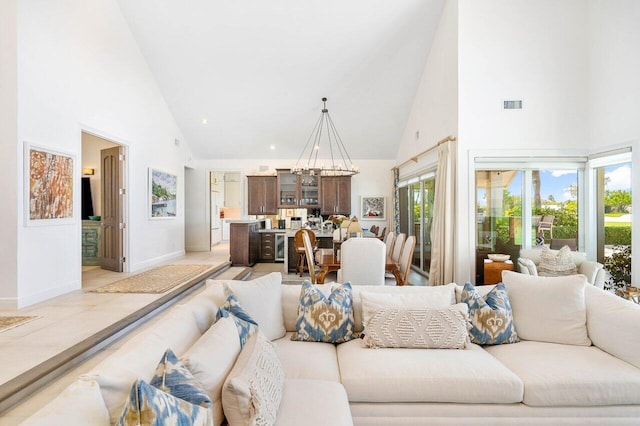 tiled living room with high vaulted ceiling