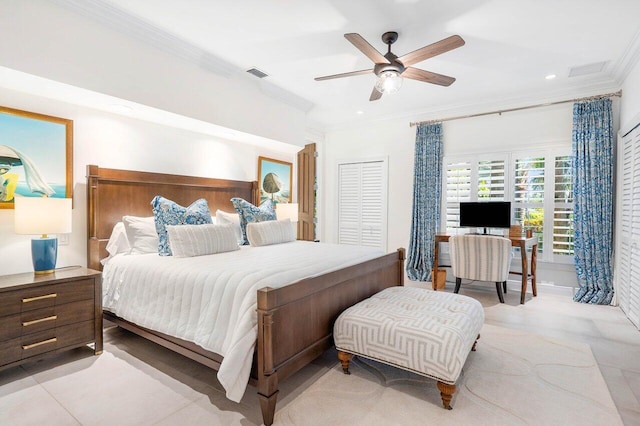 bedroom with light tile floors, a closet, ceiling fan, and ornamental molding