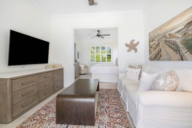 living room featuring ornamental molding and ceiling fan