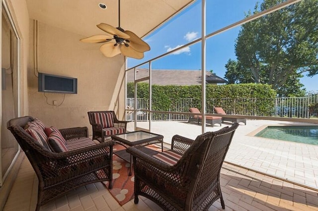 exterior space with a pool and ceiling fan