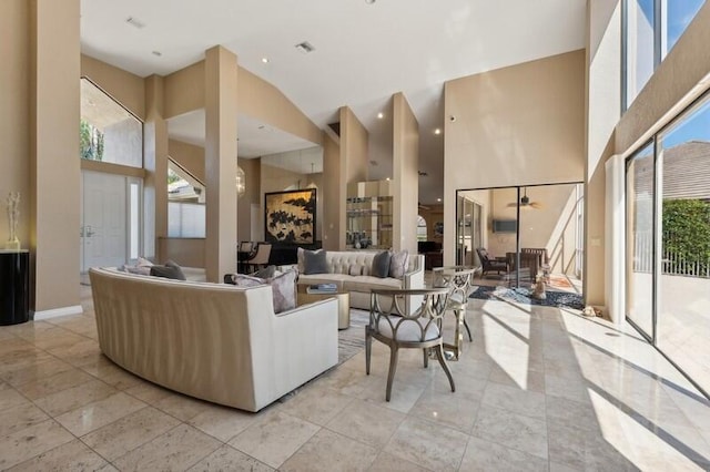 living room with a high ceiling