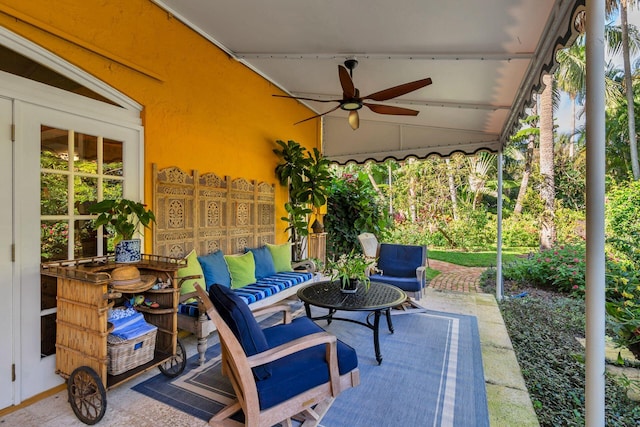 view of patio / terrace with ceiling fan and outdoor lounge area