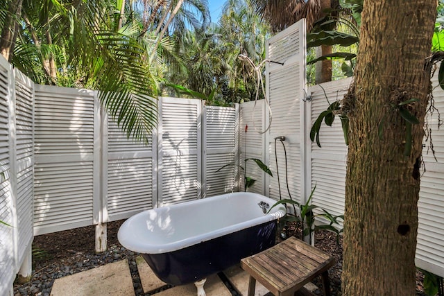 bathroom with a bathing tub