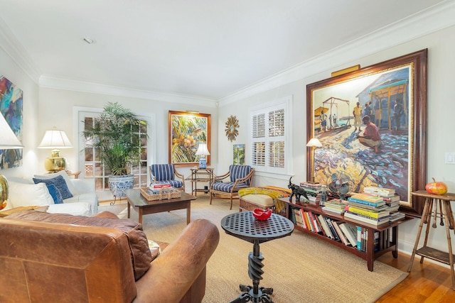 living room featuring ornamental molding and hardwood / wood-style flooring