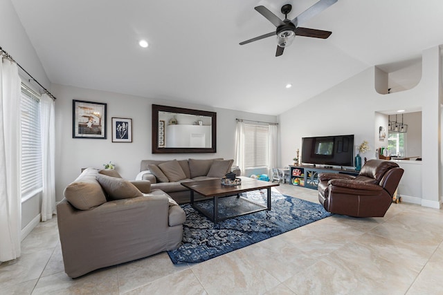 living room with lofted ceiling and ceiling fan