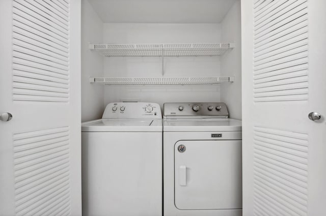 laundry area with separate washer and dryer