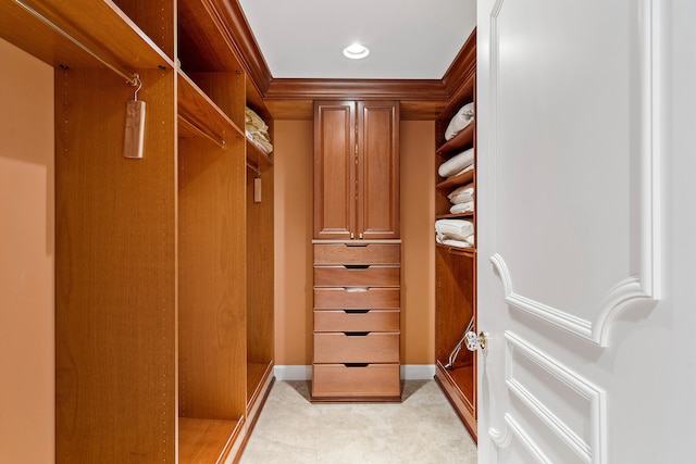 spacious closet with light tile flooring