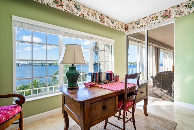 tiled office space with a water view