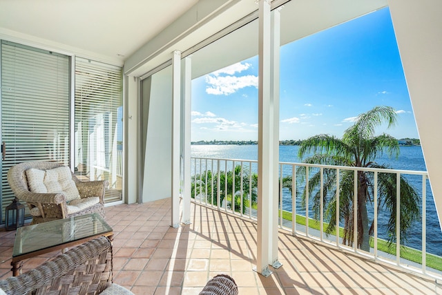 sunroom with a water view