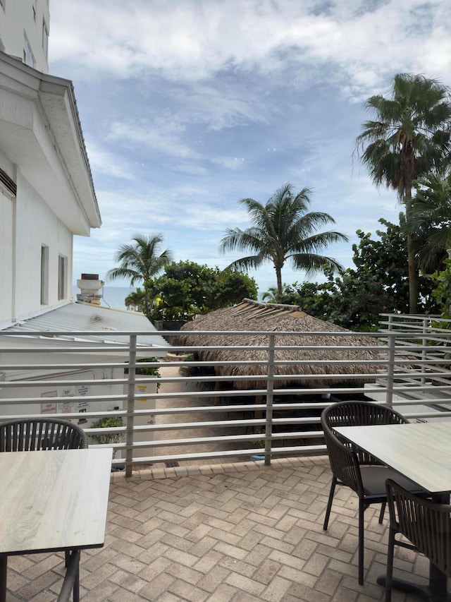 view of patio / terrace with a balcony