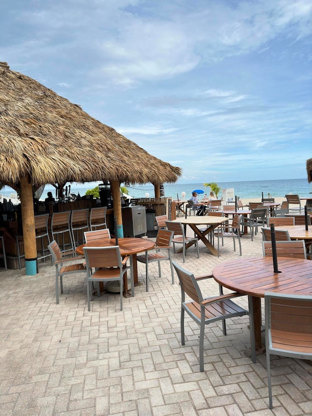 view of patio / terrace featuring a water view