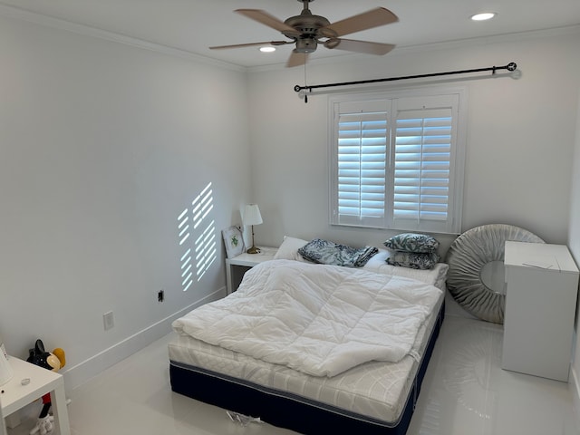 bedroom with ornamental molding and ceiling fan