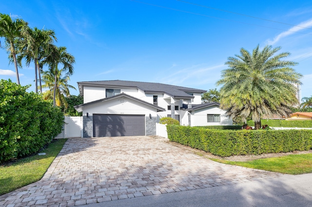 view of front of home with a garage