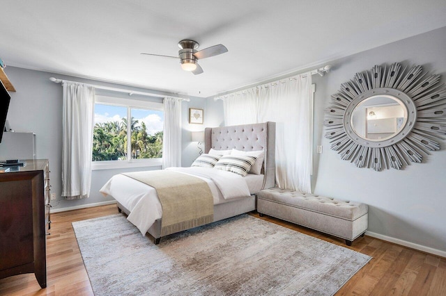 bedroom featuring ceiling fan and light wood-type flooring