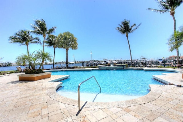 view of swimming pool featuring a patio area