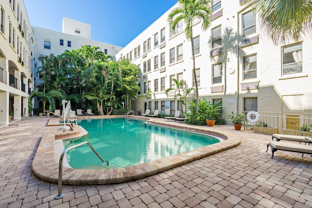 view of pool featuring a patio area