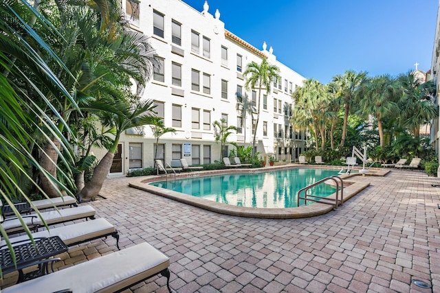 view of swimming pool with a patio area