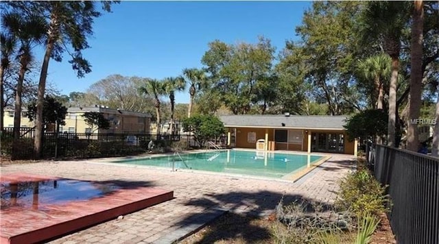 view of pool featuring a patio