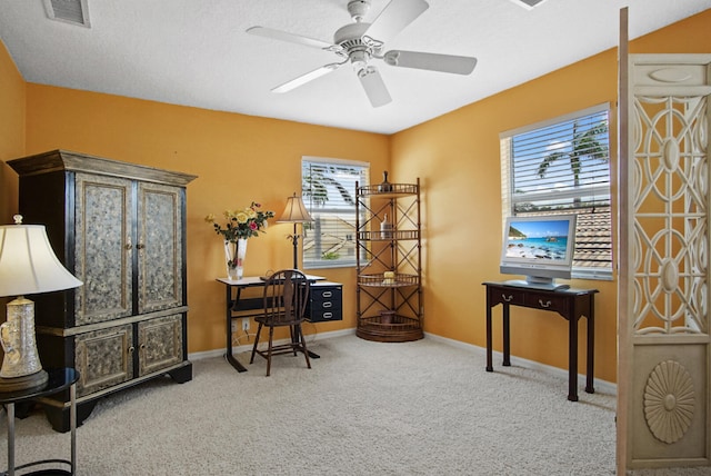 office area featuring carpet floors and ceiling fan